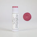 A hydrating pink tinted lip balm with a natural shimmer, made with beeswax and peppermint oil.